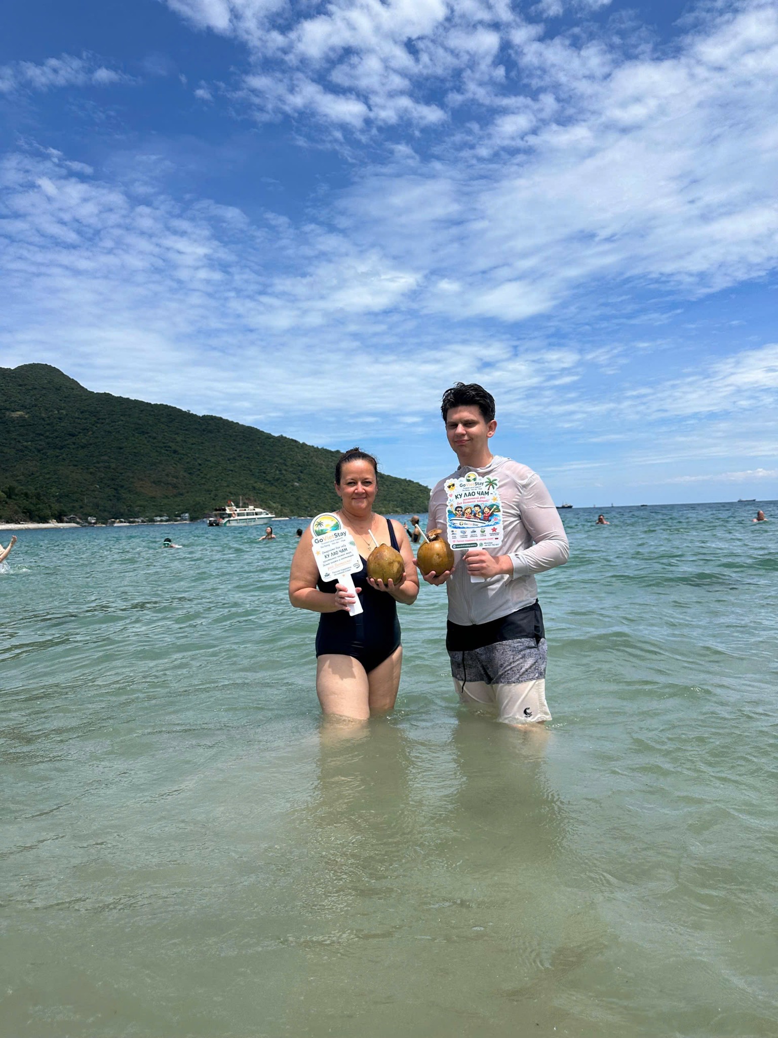 GoVietStay guests on a Cham Island beach