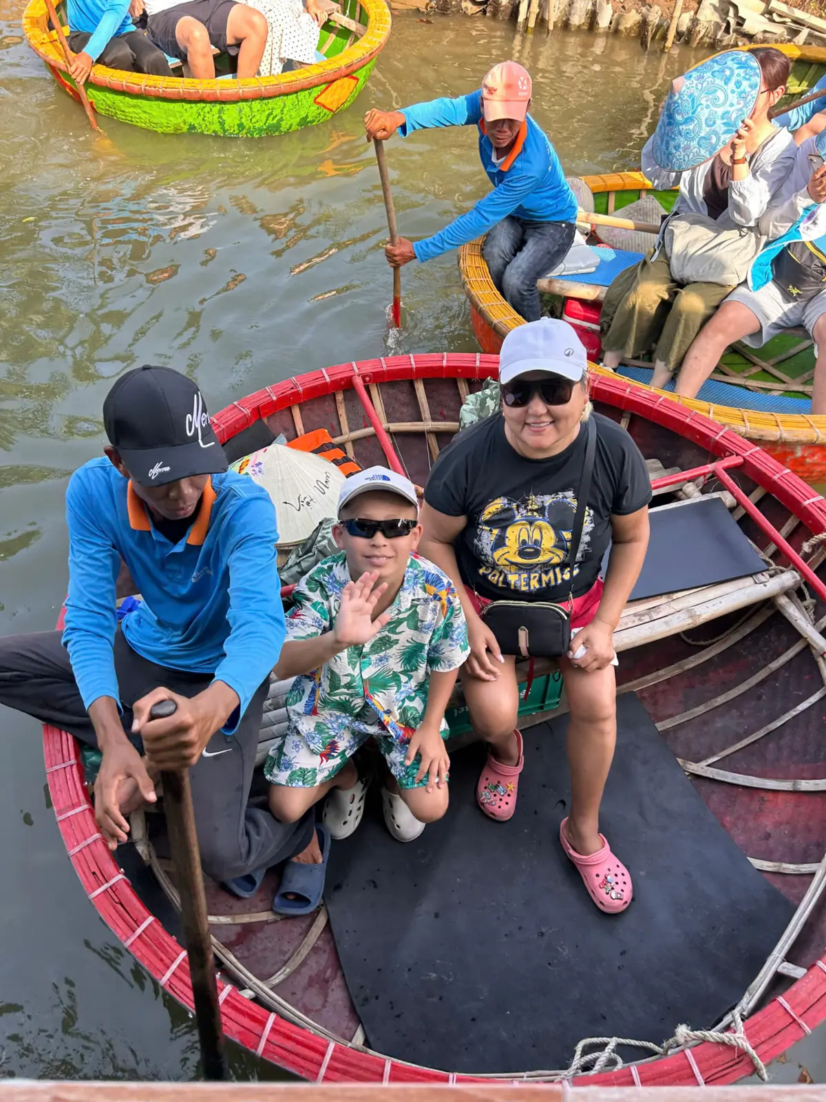 Guests enjoying a basket boat in the coconut forest