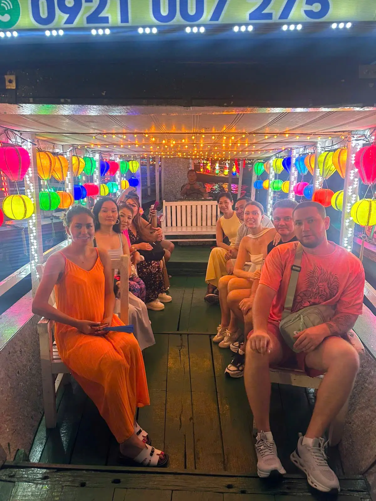 Guests on a lantern boat in Hoi An
